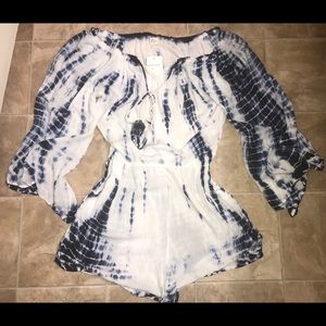 Off the shoulder, loose-fit, tie dye romper.